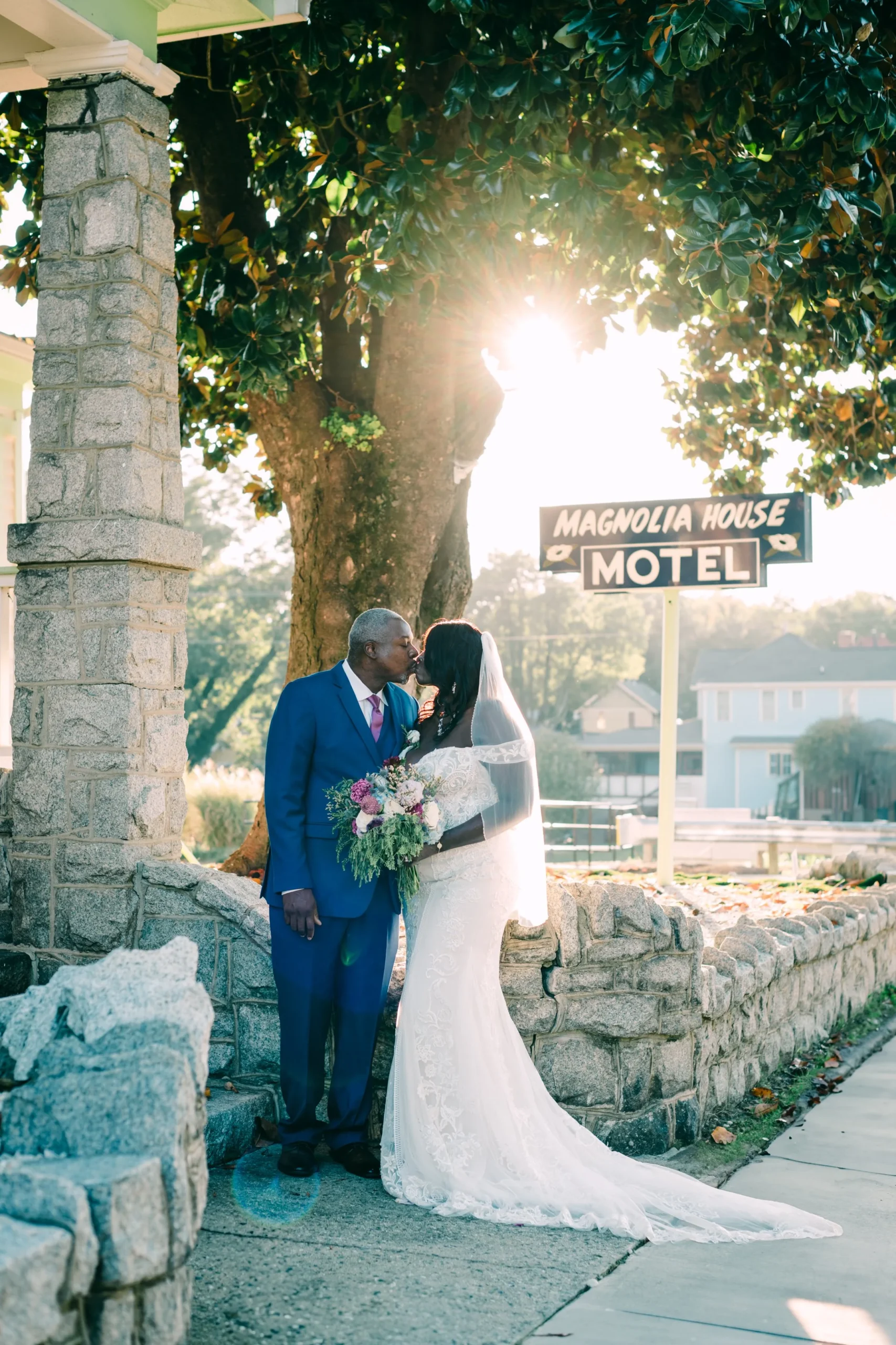  Kheesa and Anthony in front of  The Historic Magnolia House , photographed by  Lauren Depuy Photography . 