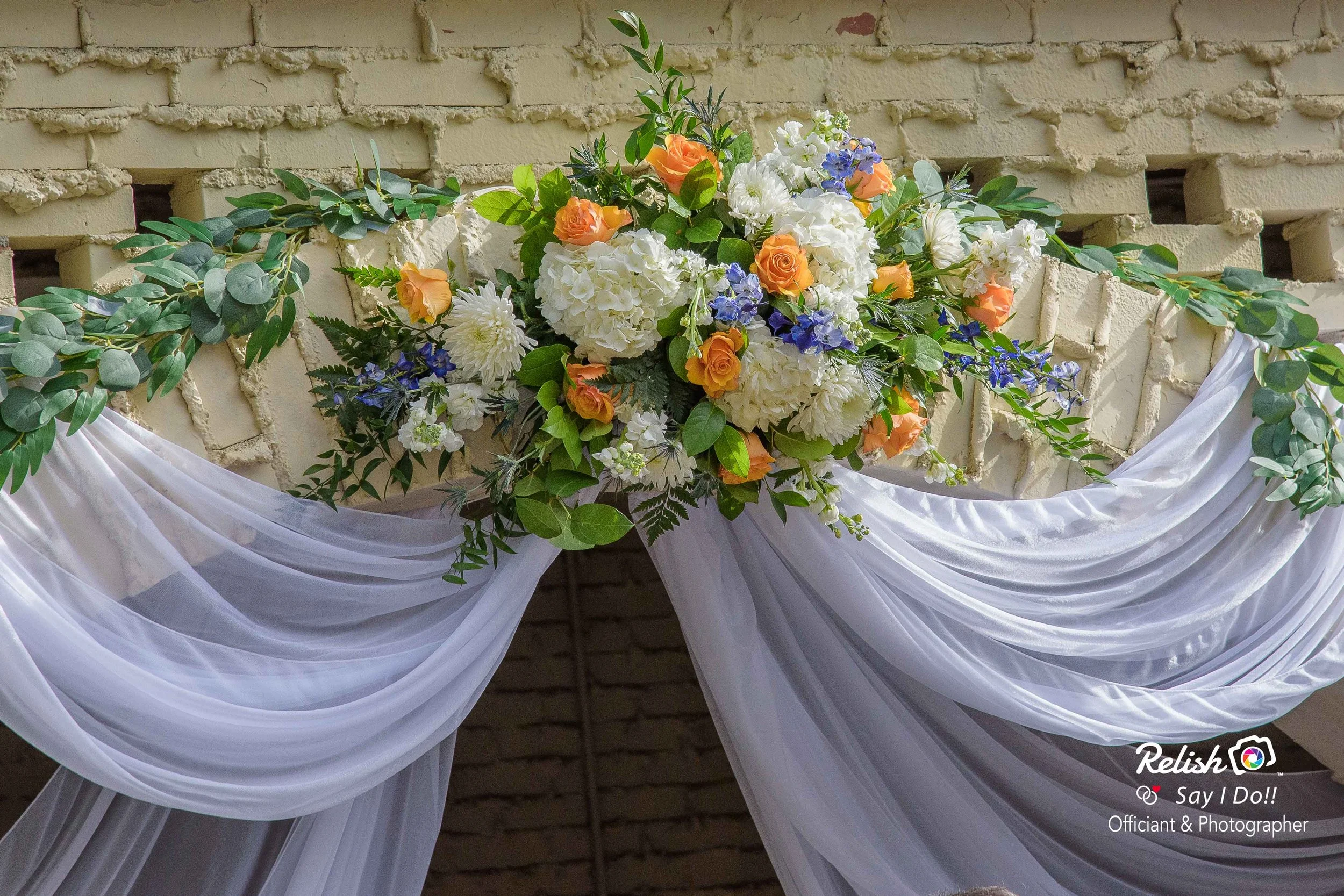  The altar piece. Florals by  Jeff’s Flowers Of Course!  and designed, set up, and decorated by   K.S.Otter Events  ’ team. Photographed by  Relish Say I Do! Officiant & Photographer.  